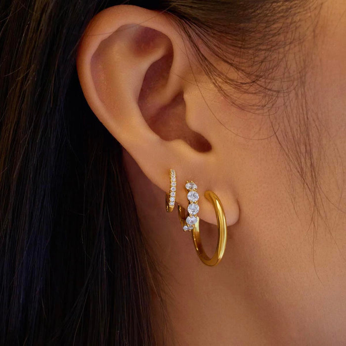 Ania Haie Cubic Zirconia Huggy Hoop Earrings in Sterling Silver with 14kt Yellow Gold Plate