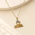 Boy with Plaquinha Pendant in 18K Gold