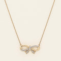 Diamond Bowtie Necklace in Sterling Silver with Yellow Gold Plating (1/10ct tw)