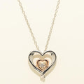 Diamond Flutter Heart Necklace in Sterling Silver and Rose Gold Plate (1/20ct tw)