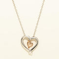 Heart Necklace in Sterling Silver and 10kt Rose Gold with Diamonds (.01ct tw)