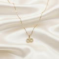 Infinity Pendant with Cubic Zirconia in 18K Gold