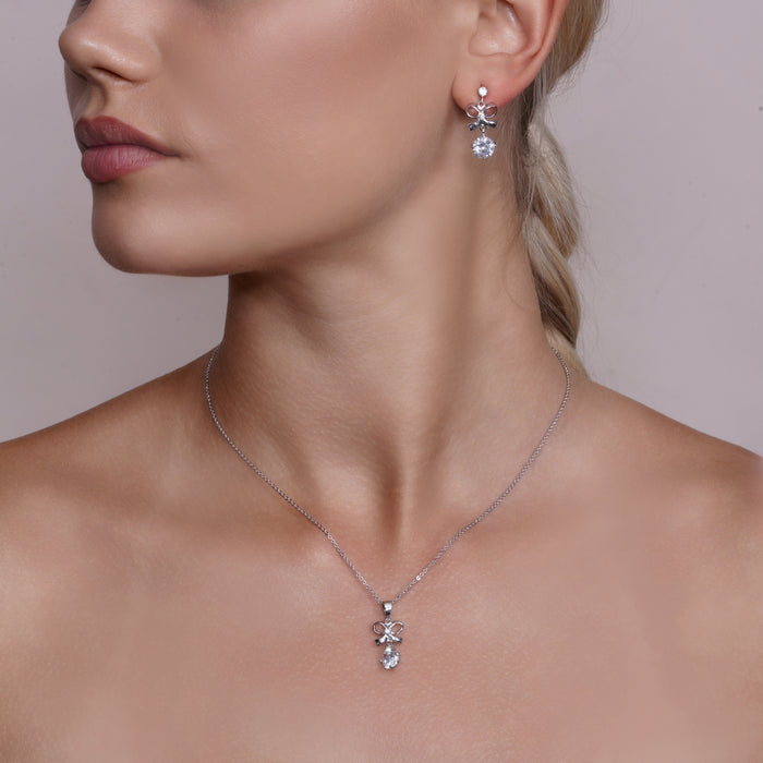 Rhodium Plated 925 Sterling Silver Clear Bow CZ Hanging Earring and Necklace Set - BGS00229 | Silver Palace Inc.